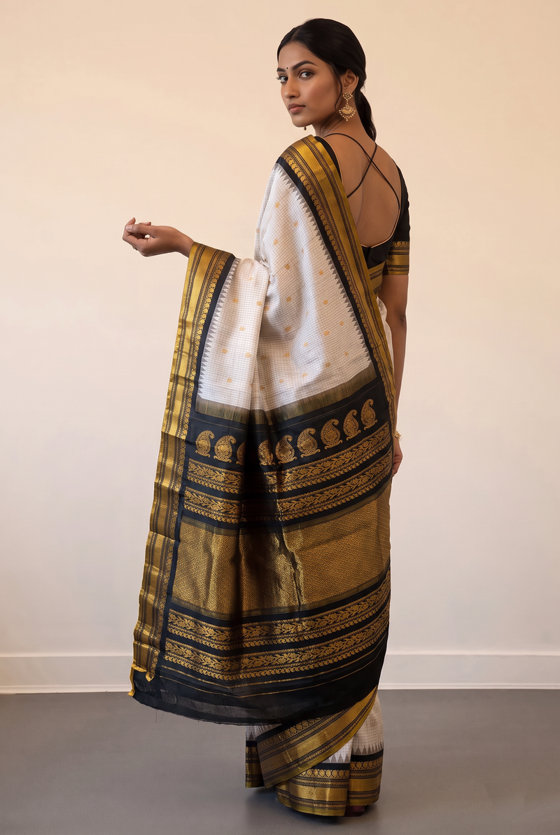 Black, white and gold, timelessly paired. Handloom Gadwal silk.