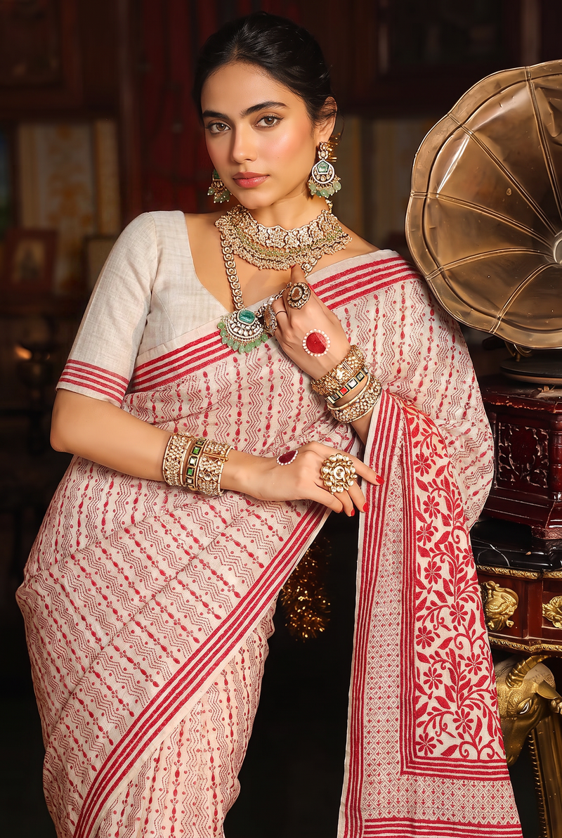 One colour. One thread. A thousand flowers, stitched by hand on ivory silk. Handcrafted Gachi Tussar.