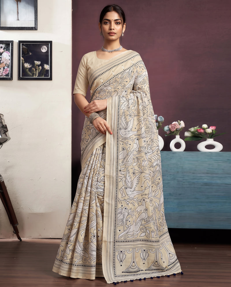 Ivory on ivory, birds in bloom, a scalloped sigh. Handcrafted Kantha from Bolpur.