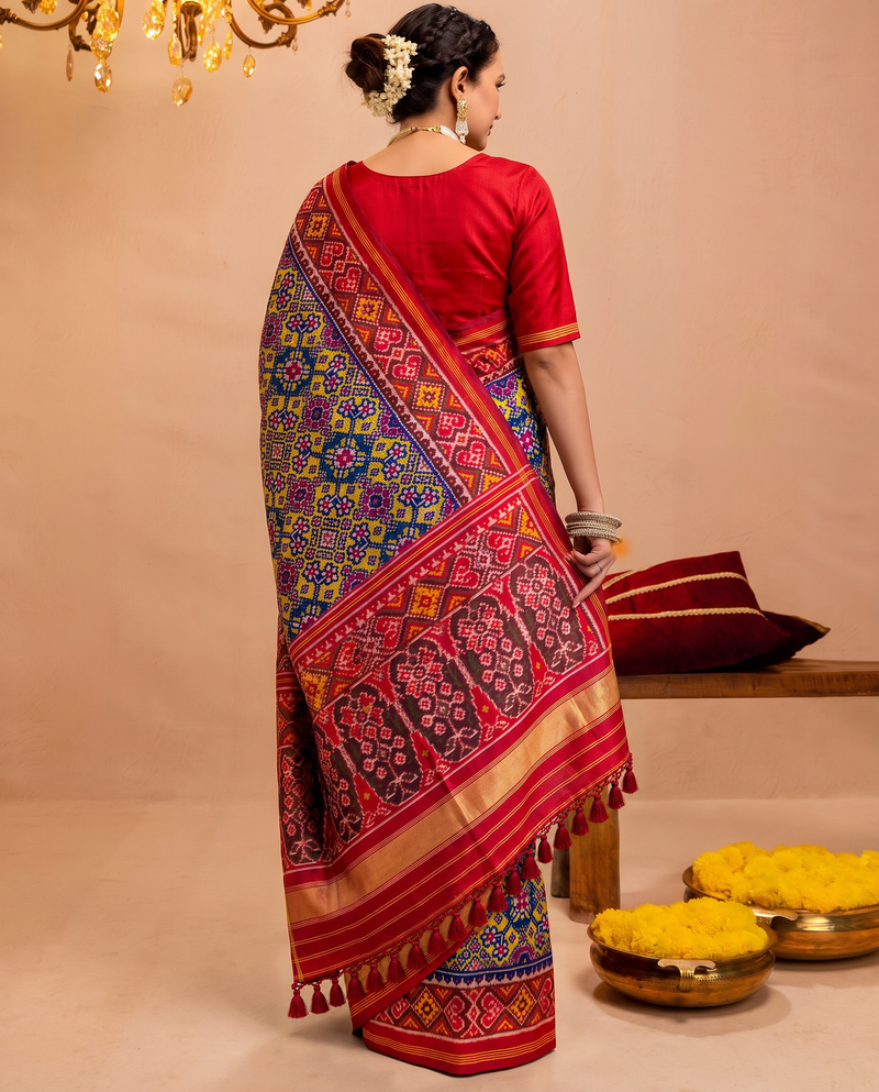 Navratna, nine gems woven in indigo and gold. Handloom Rajkot Patola from Gujarat.
