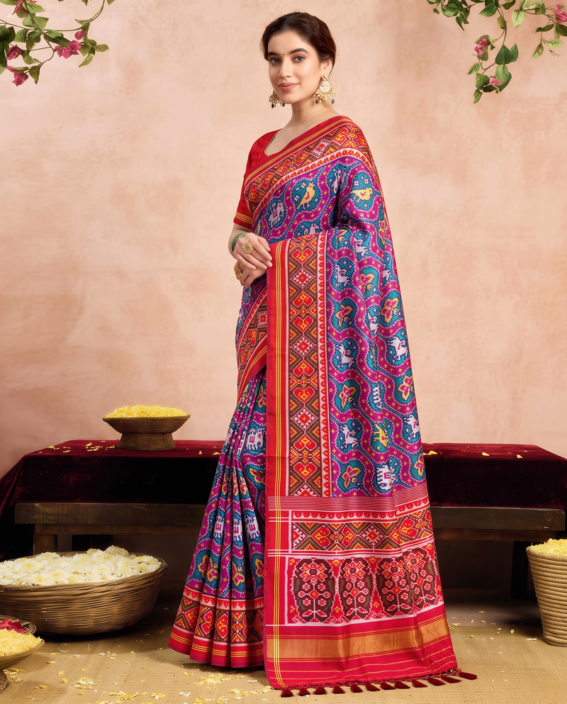 Waves of magenta and teal, woven by hand. Handloom Rajkot Patola from Gujarat.