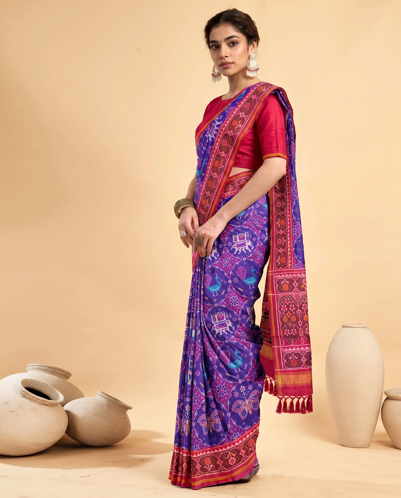 Purple dreams in a rani pink frame. Handloom Rajkot Patola from Gujarat.