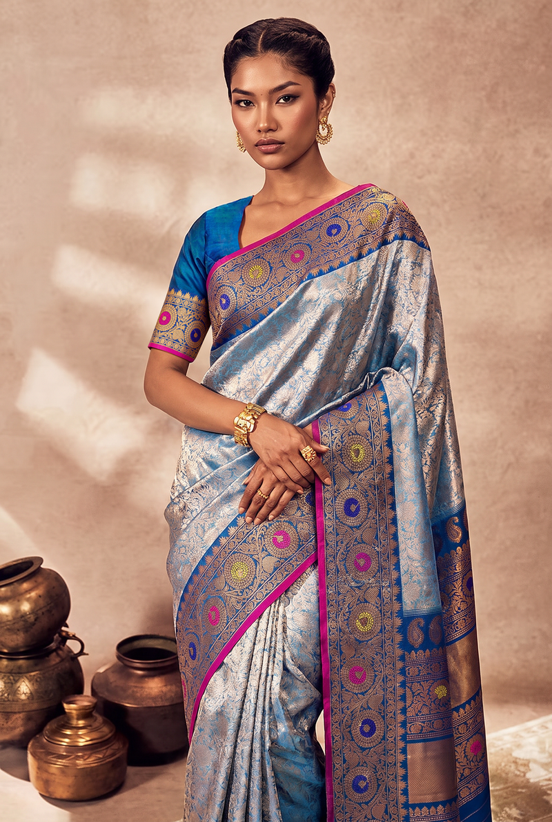 Lavender twilight, royal blue night, golden blooms. Handloom Gadwal silk.