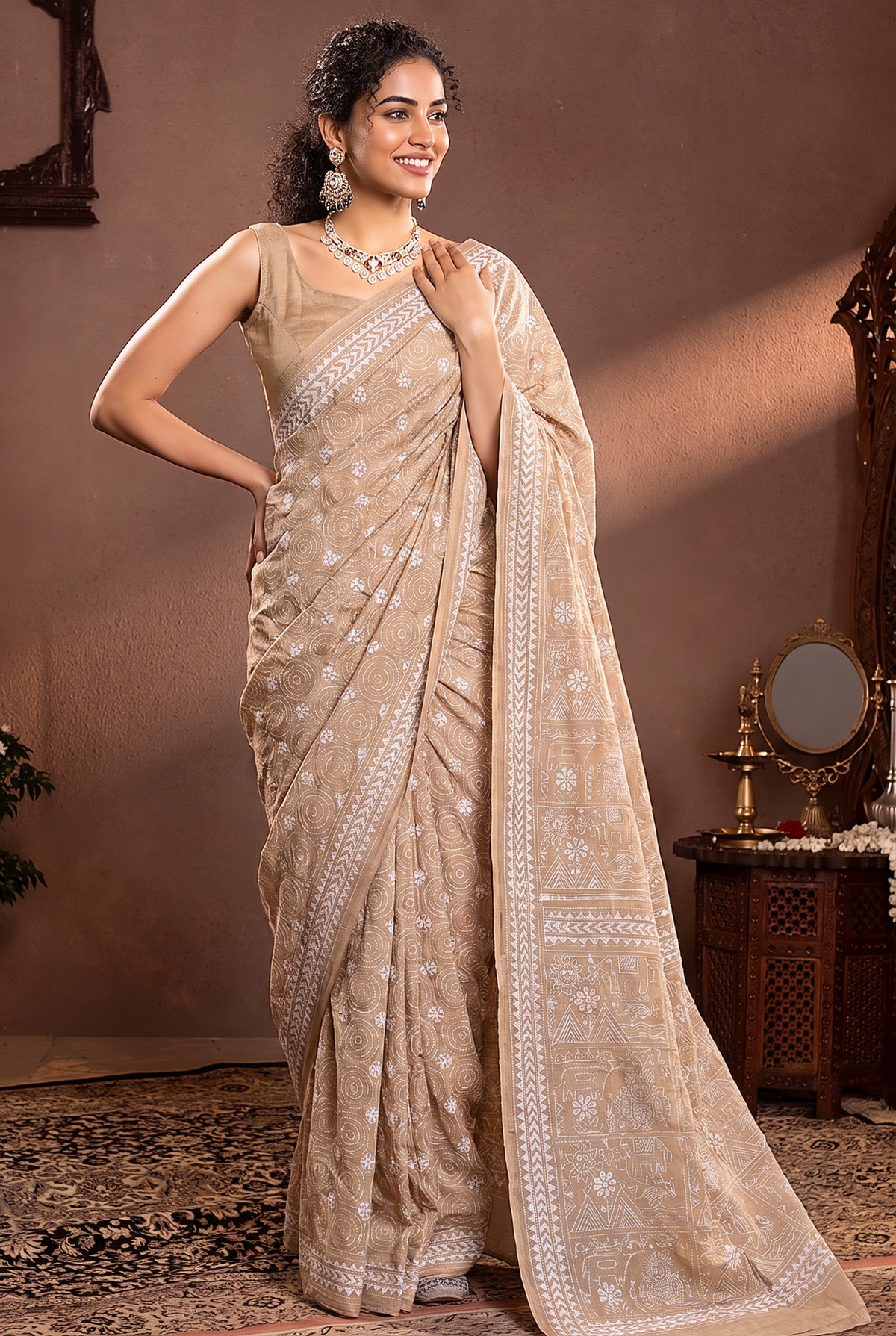 White thread on ivory silk, like moonlight in a garden. Birds, branches and blossoms bloom in hand-stitched silence across soft Gachi Tussar.