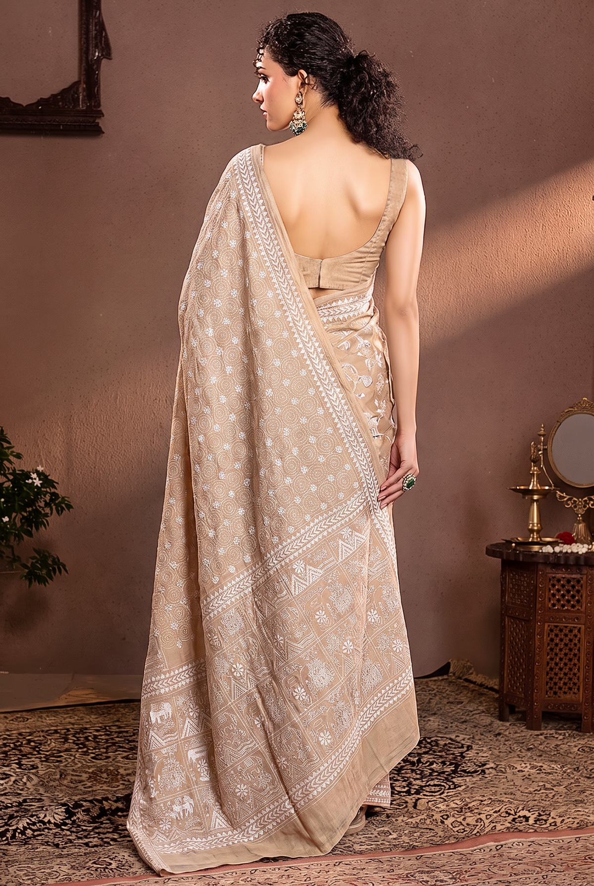 White thread on ivory silk, like moonlight in a garden. Birds, branches and blossoms bloom in hand-stitched silence across soft Gachi Tussar.