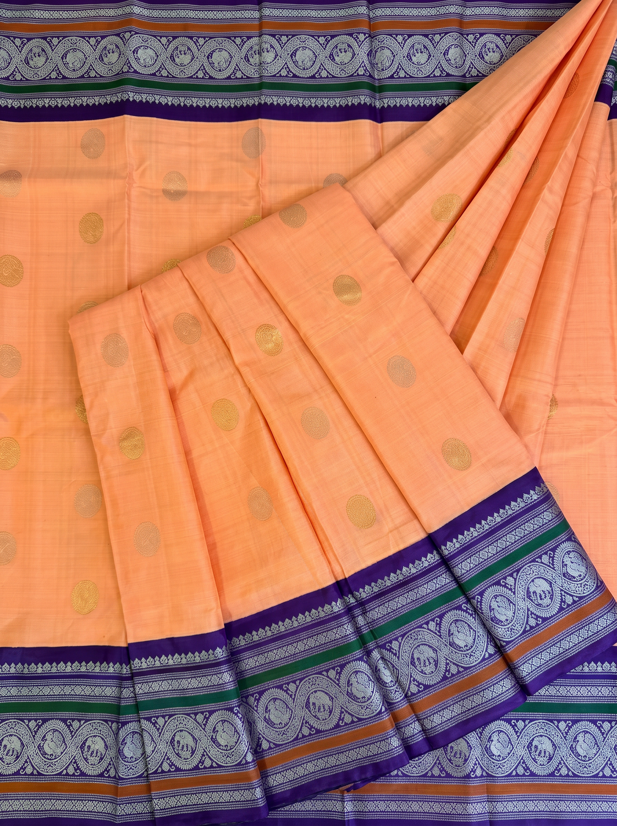 Peach sunrise, violet dusk, silver moons. Handloom Gadwal silk.