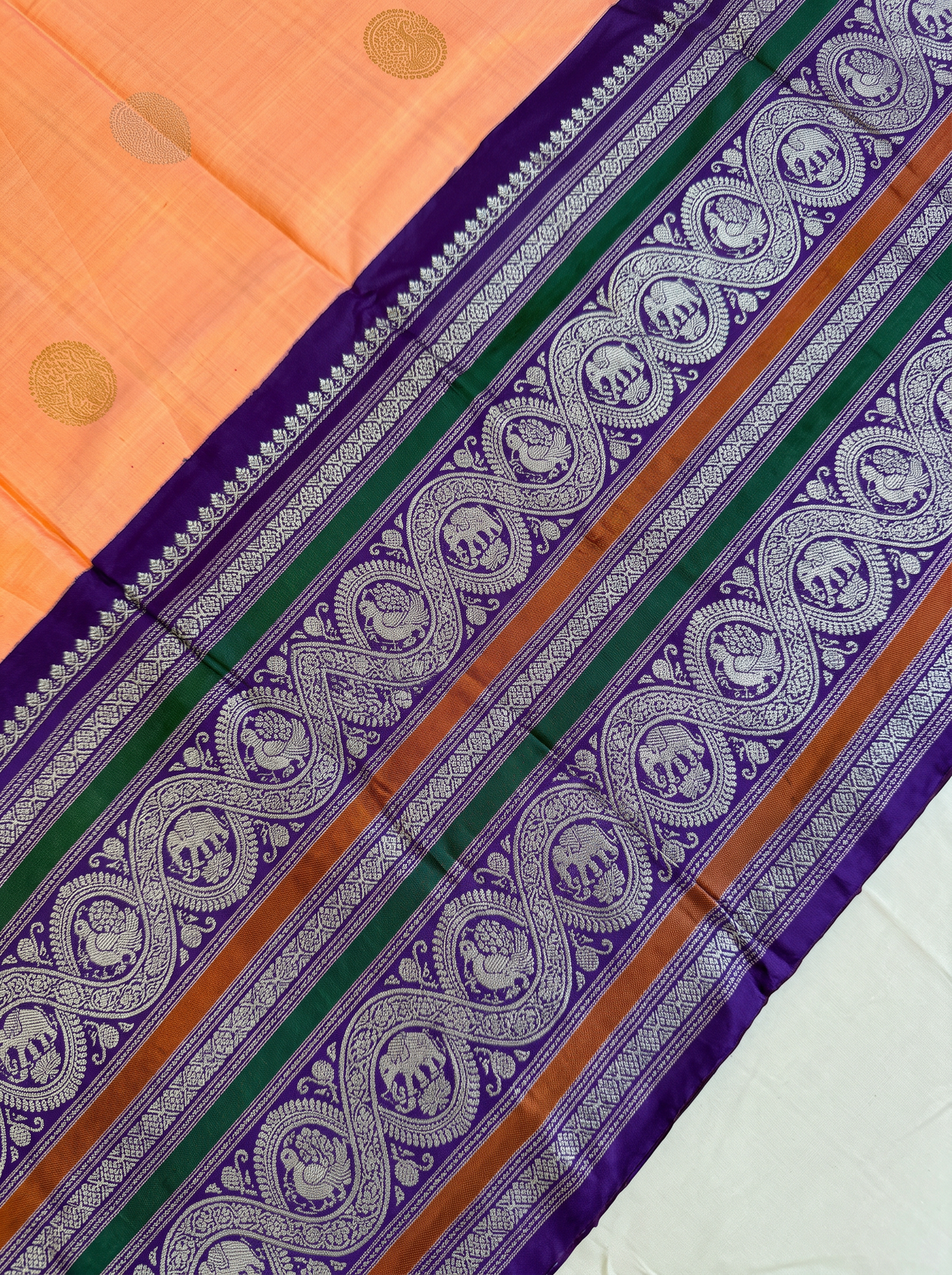 Peach sunrise, violet dusk, silver moons. Handloom Gadwal silk.