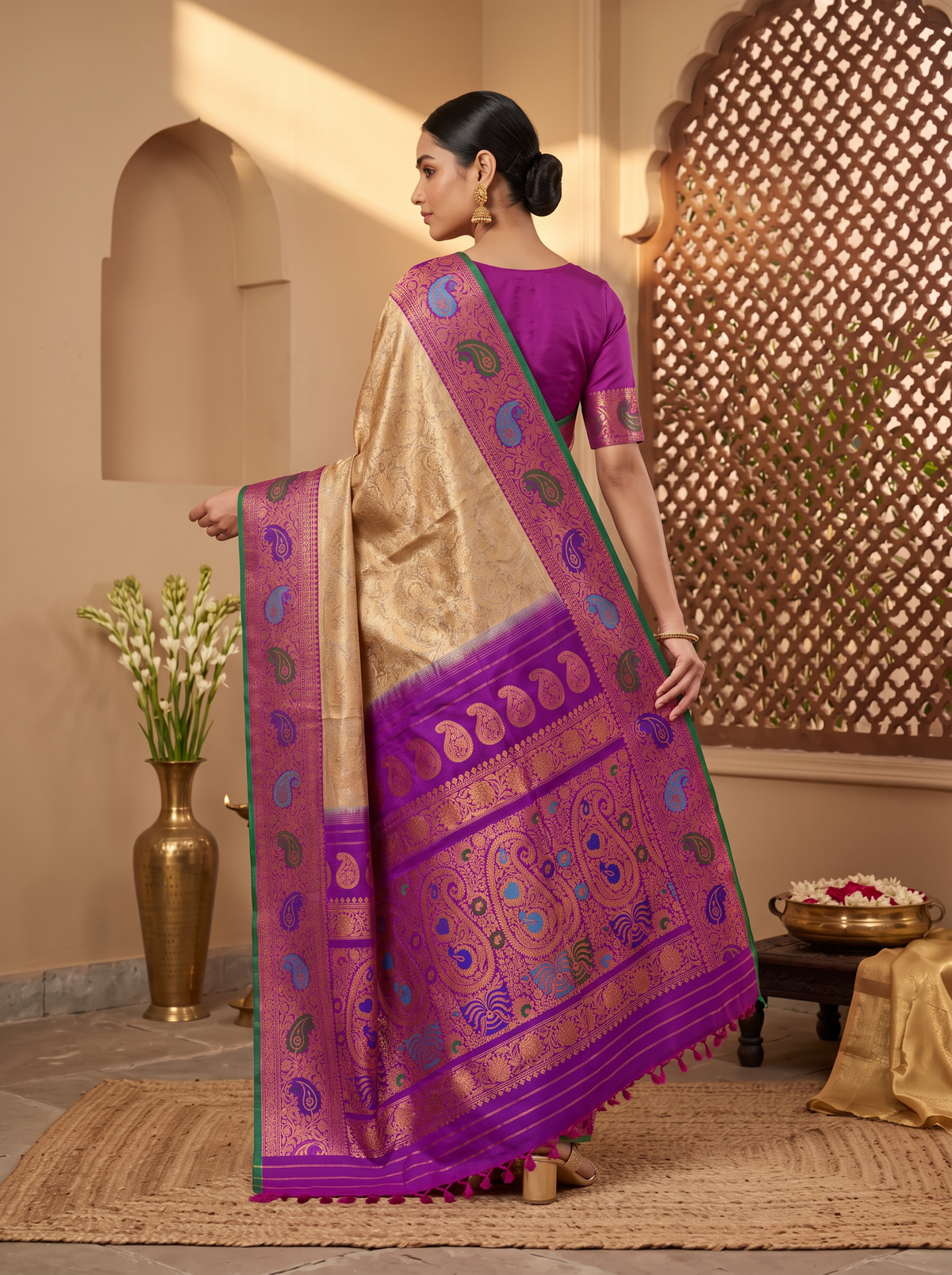 Golden dawn meets royal purple, bright with meenakari paisleys. Handloom Gadwal silk.