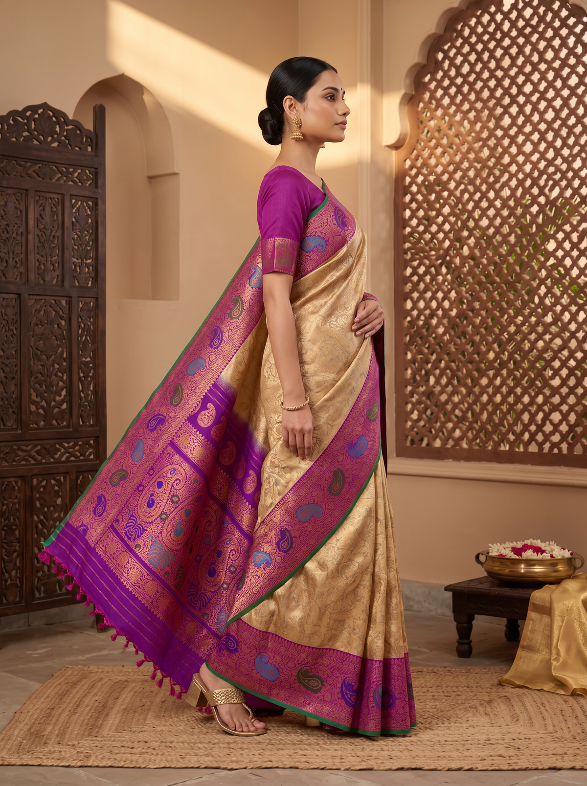 Golden dawn meets royal purple, bright with meenakari paisleys. Handloom Gadwal silk.