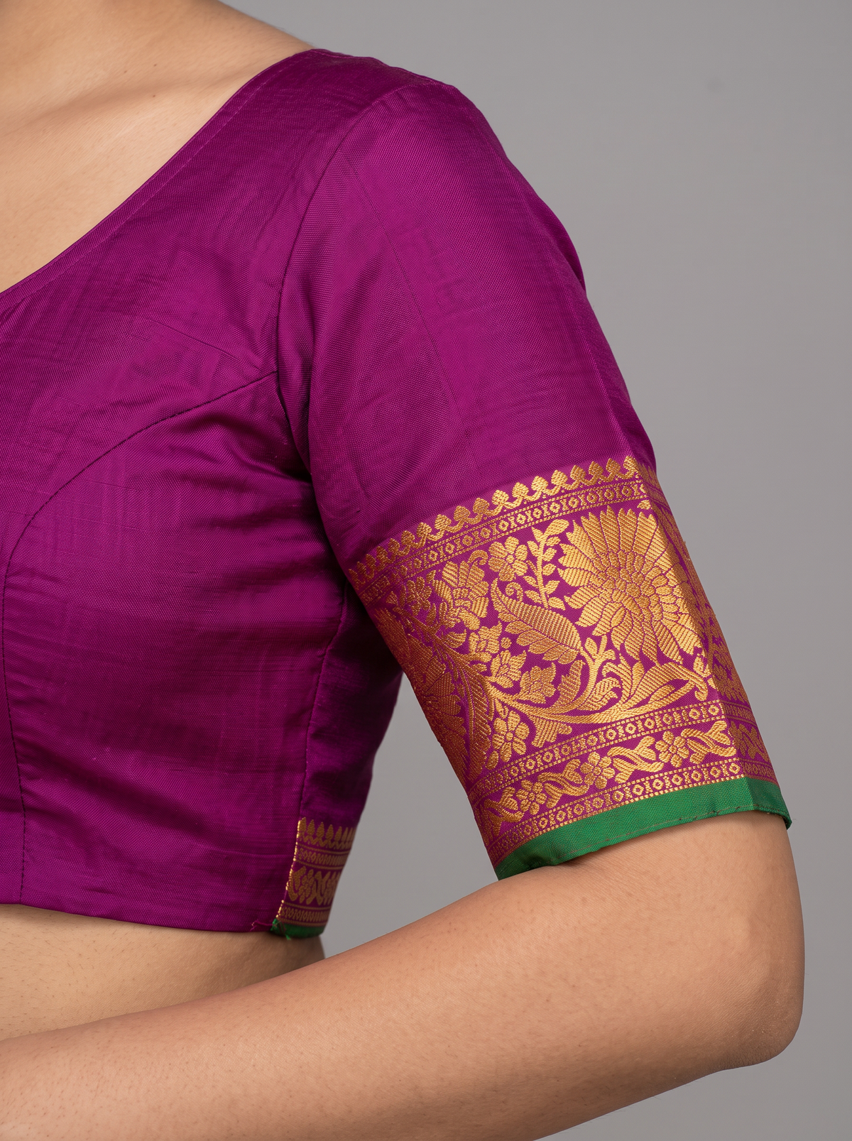 Gold-beige brocade melting into royal purple. A Kanchi-style border strewn with jewel-bright meenakari paisleys. Handwoven Gadwal silk from Telangana, as timeless as the looms that made it.