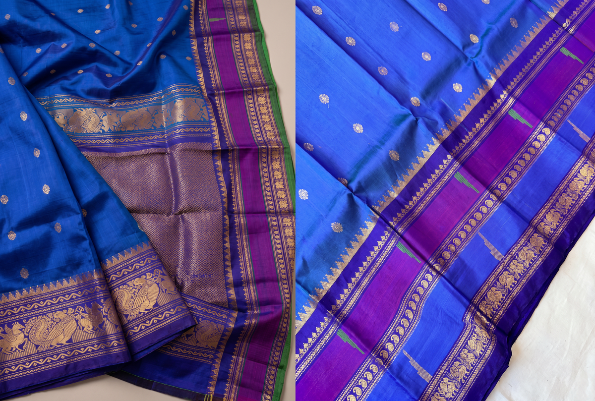 Like a clear midnight sky sprinkled with golden stars, this blue Gadwal silk is edged with peacocks and a blush of pink, finishing in a pallu rich with gold zari.