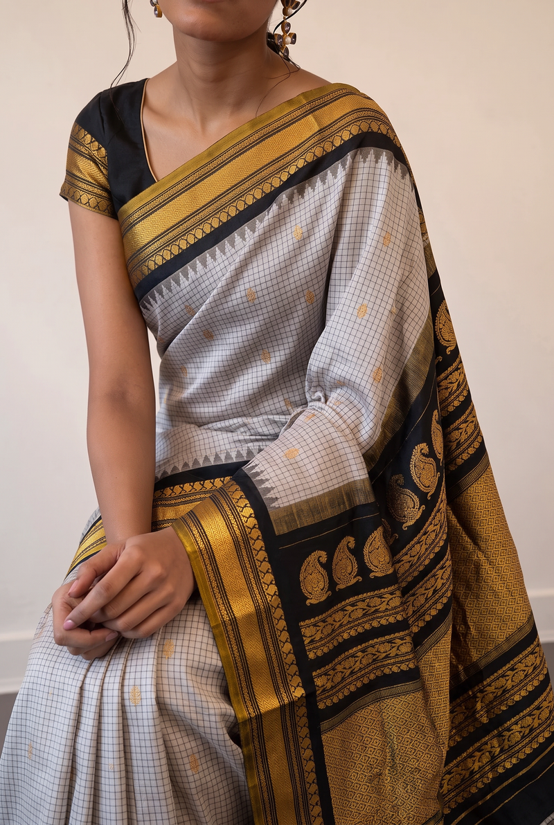Black, white and gold, timelessly paired. Handloom Gadwal silk.
