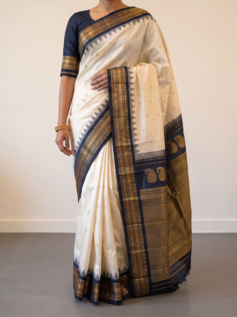 Moonlit ivory, a night of gold paisleys. Handloom Gadwal.