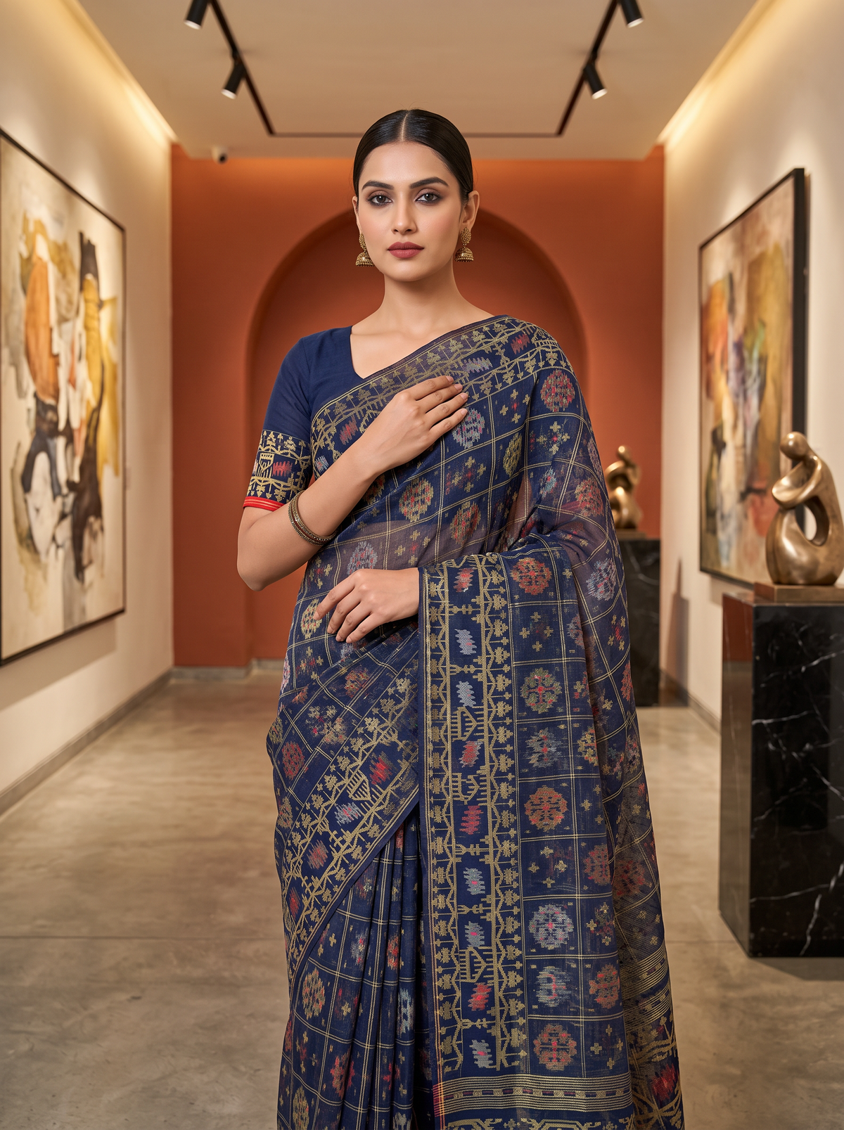 A Midnight Blue Dhakai Jamdani — Jewel-Toned Florals in Antique Gold, Coral, Muted Rose & Silver-Grey with a Vermilion-Red Edge