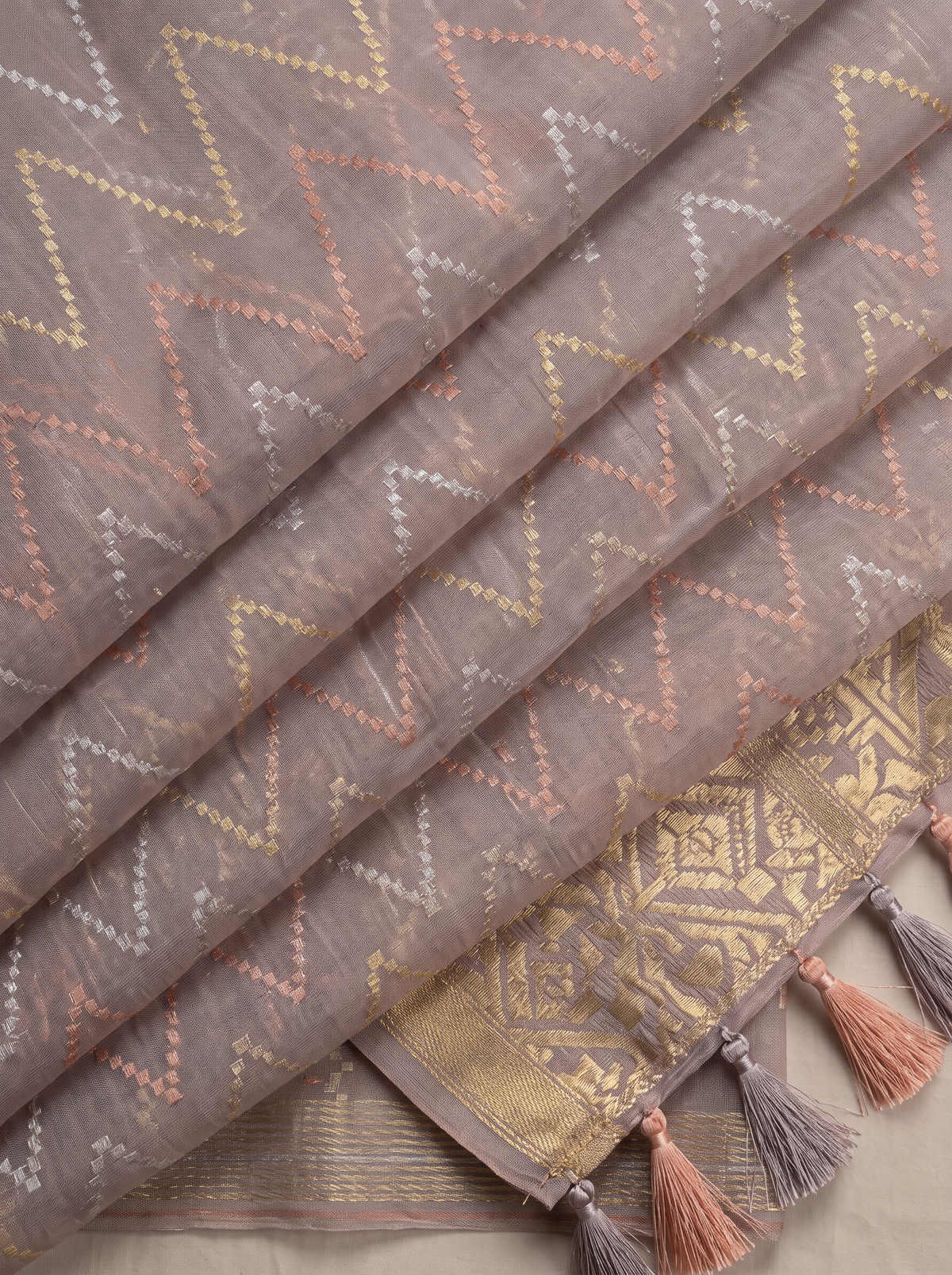 A Symphony of Geometry and Grace — Mauve-Brown Dhakai Jamdani Illuminated with Antique Gold, Silver-White & Burnt Orange