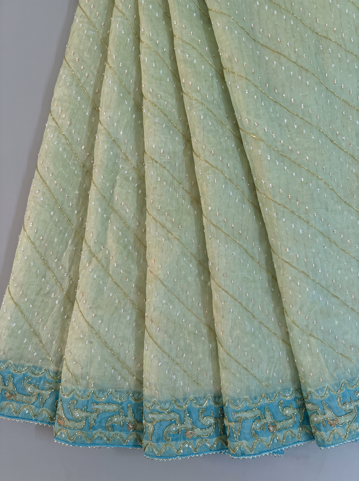 A Cascade of Ivory and Turquoise — The Delicate Shimmer of Cutdana Dhakai Jamdani