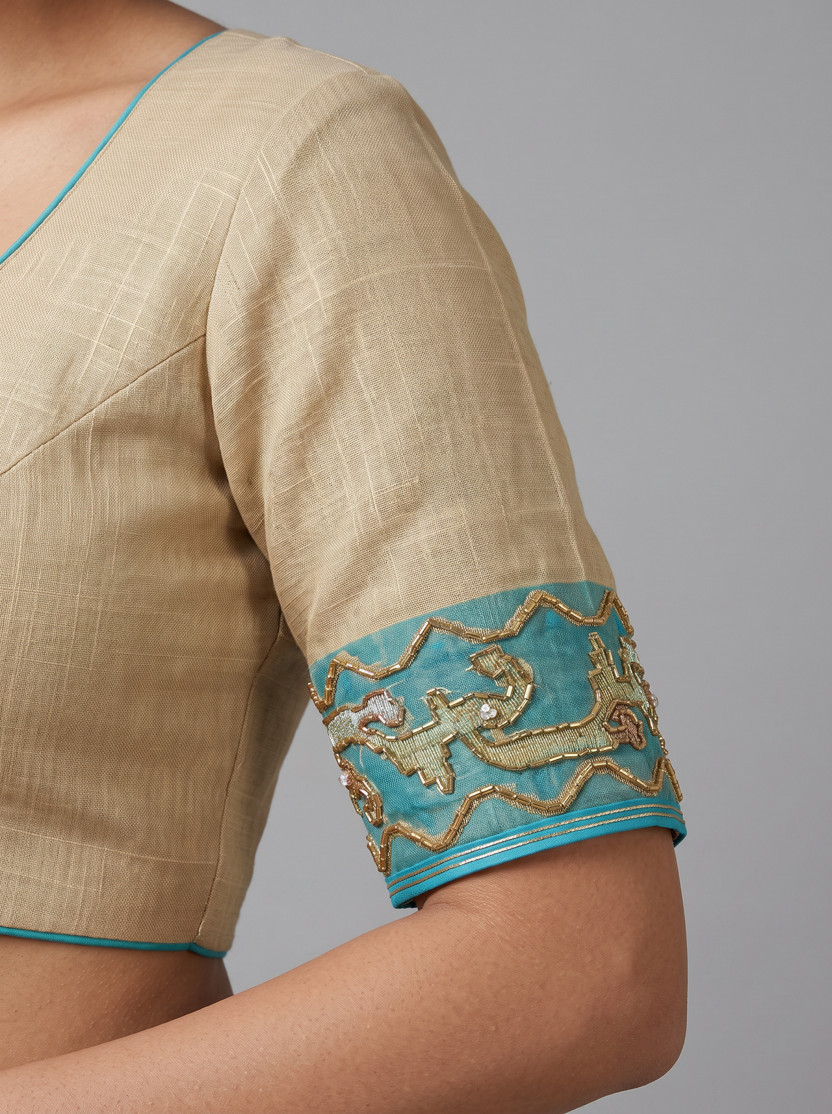A Cascade of Ivory and Turquoise — The Delicate Shimmer of Cutdana Dhakai Jamdani