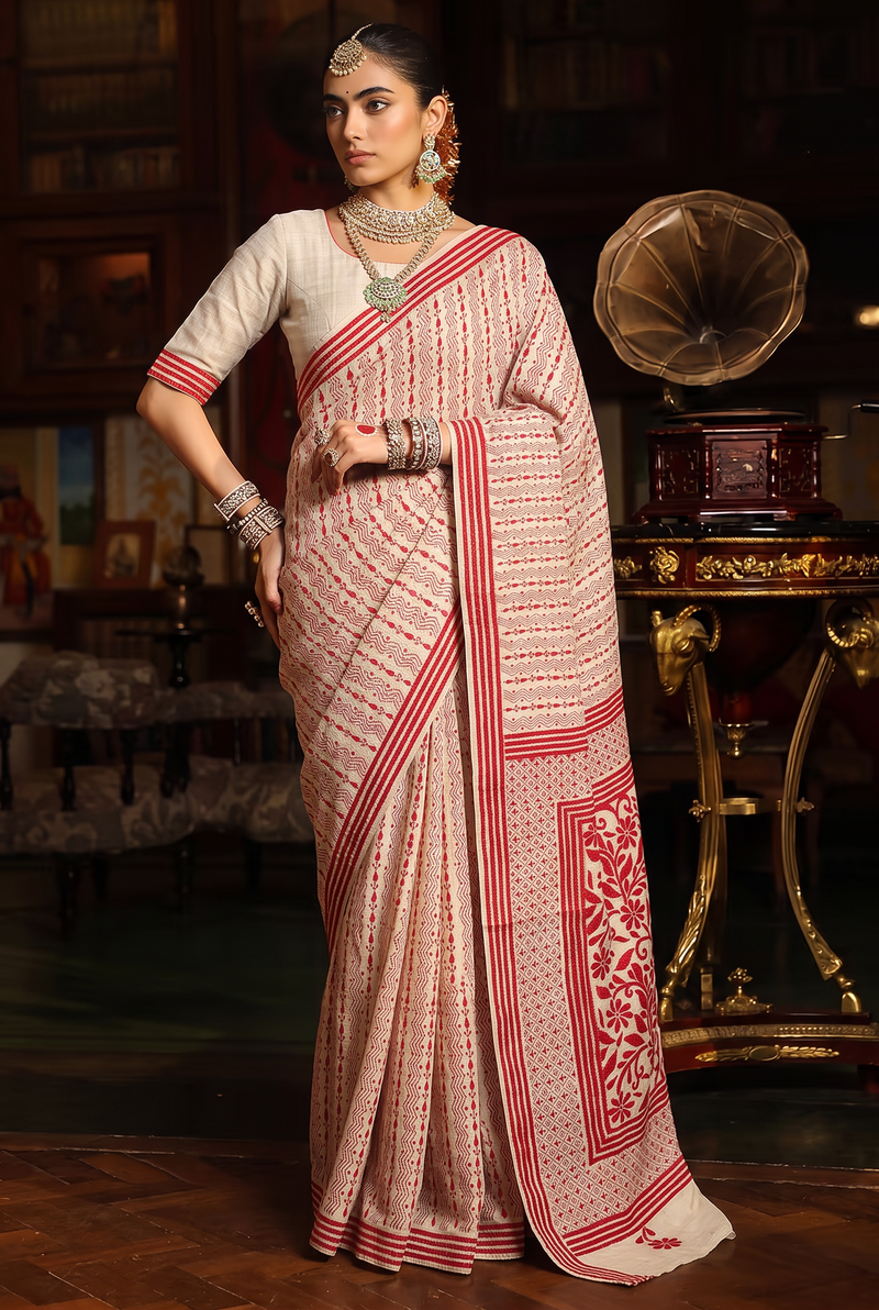 One colour. One thread. A thousand flowers, stitched by hand on ivory silk. Handcrafted Gachi Tussar.