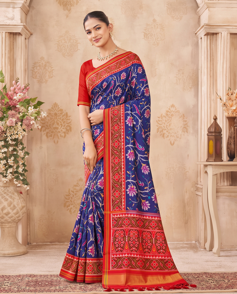 A moonlit garden, woven in royal blue. Handloom Patola from Gujarat.