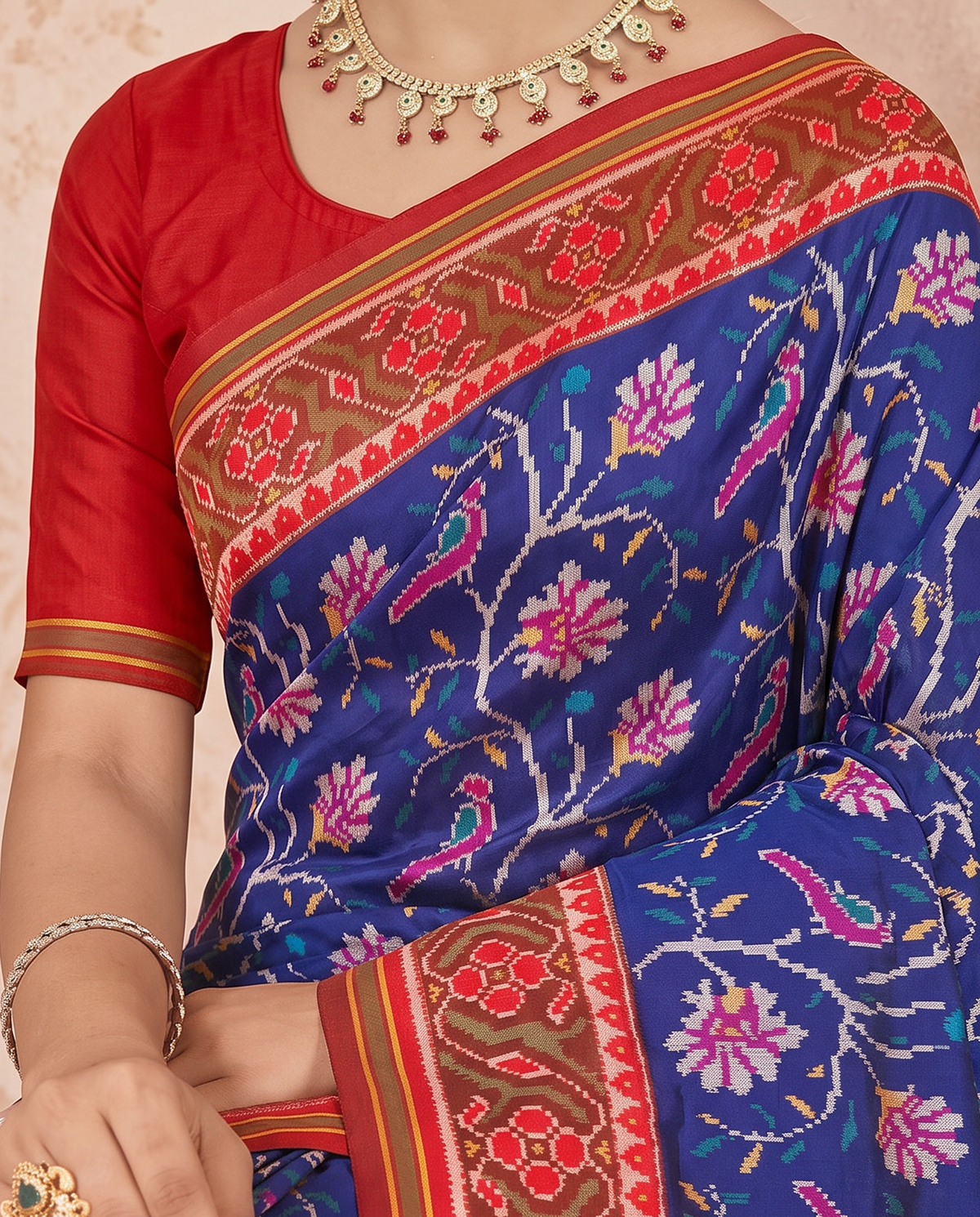 A moonlit garden, woven in royal blue. Handloom Patola from Gujarat.