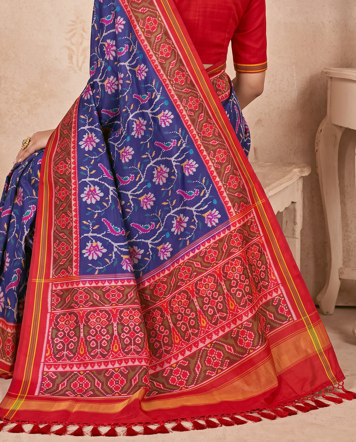 A moonlit garden, woven in royal blue. Handloom Patola from Gujarat.