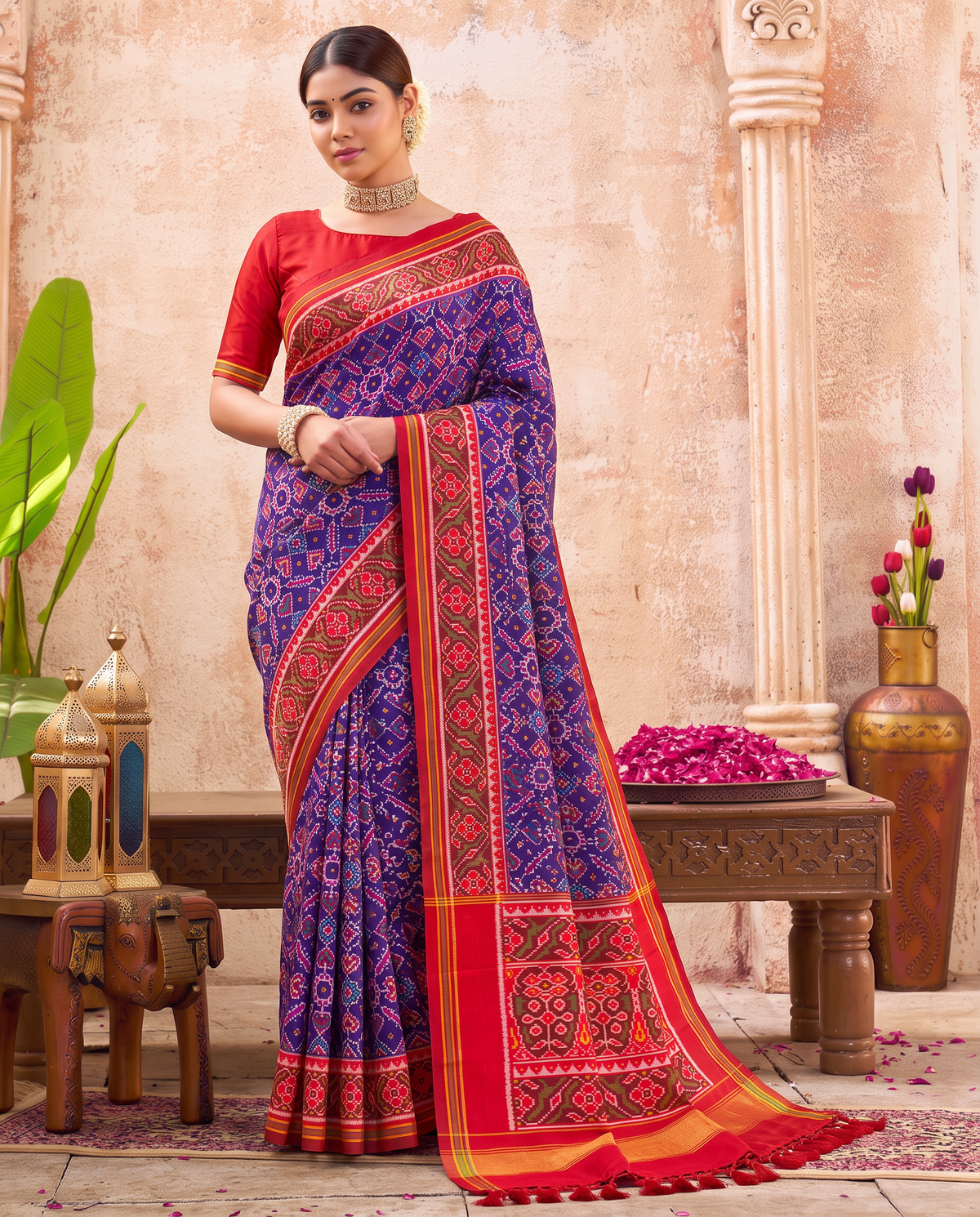 Indigo hearts and diamonds, a doorway of torans, a golden welcome. Handloom Rajkot Patola from Gujarat.