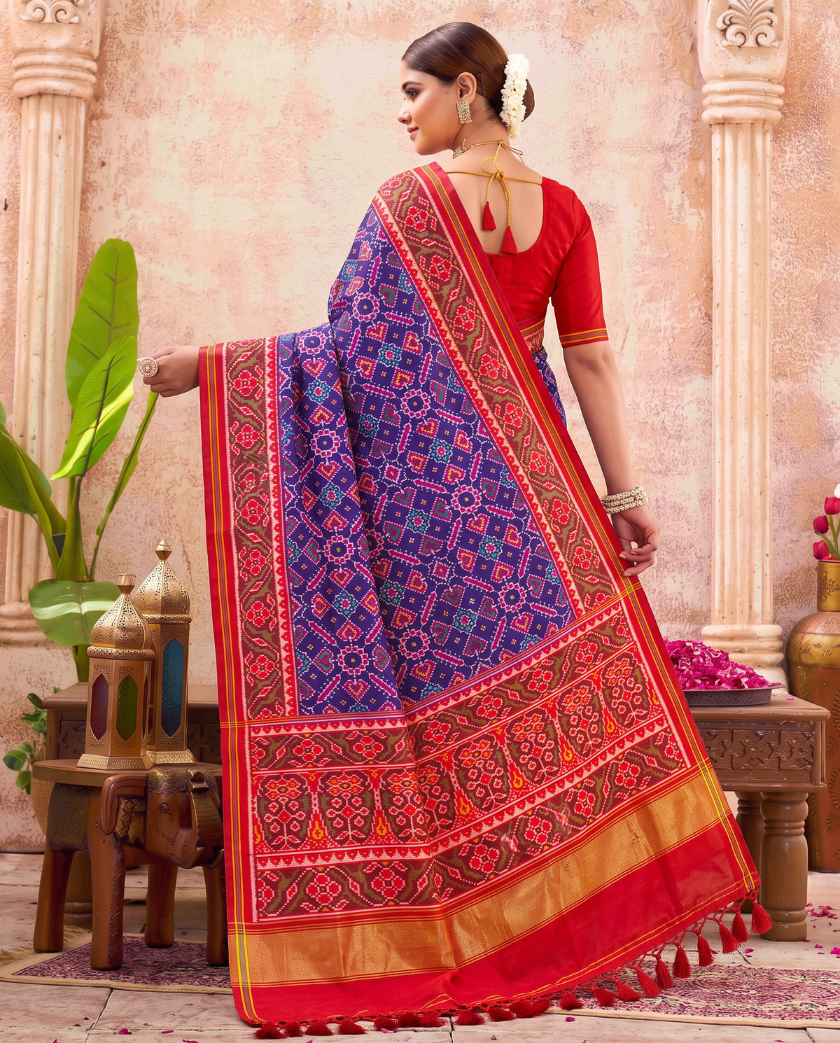 Indigo hearts and diamonds, a doorway of torans, a golden welcome. Handloom Rajkot Patola from Gujarat.