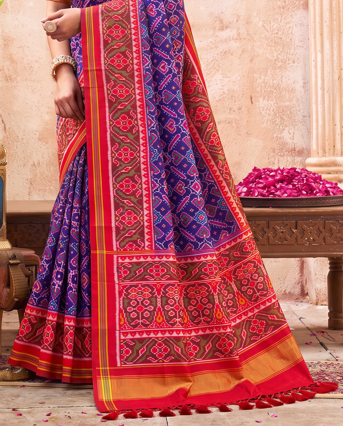 Indigo hearts and diamonds, a doorway of torans, a golden welcome. Handloom Rajkot Patola from Gujarat.