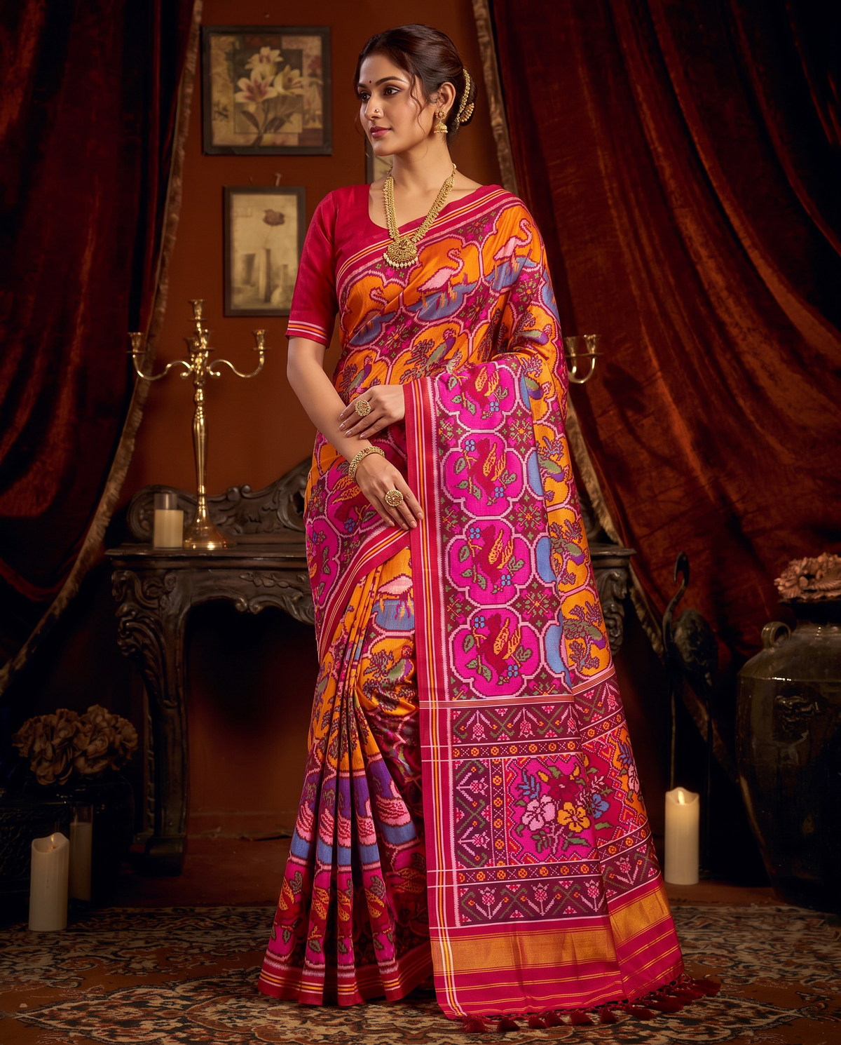 Swans drifting through four rivers of colour, held in ivory and maroon, until the silk dissolves into gold. Silk Mark certified handloom Patola from Gujarat.