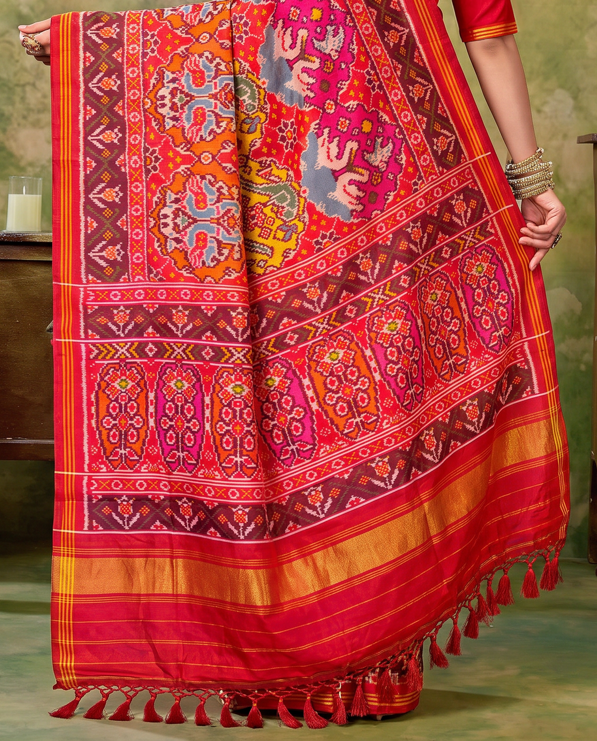 Birds in circles of colour, woven in red. Handloom Rajkot Patola from Gujarat.