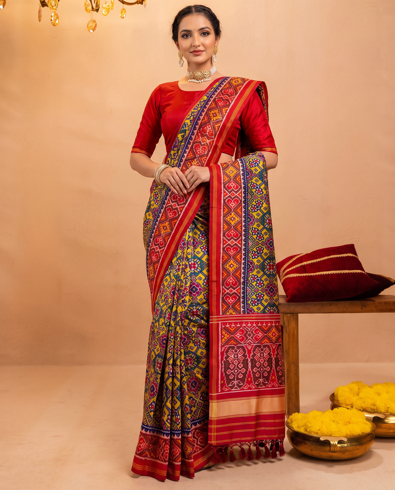 Navratna, nine gems woven in indigo and gold. Handloom Rajkot Patola from Gujarat.