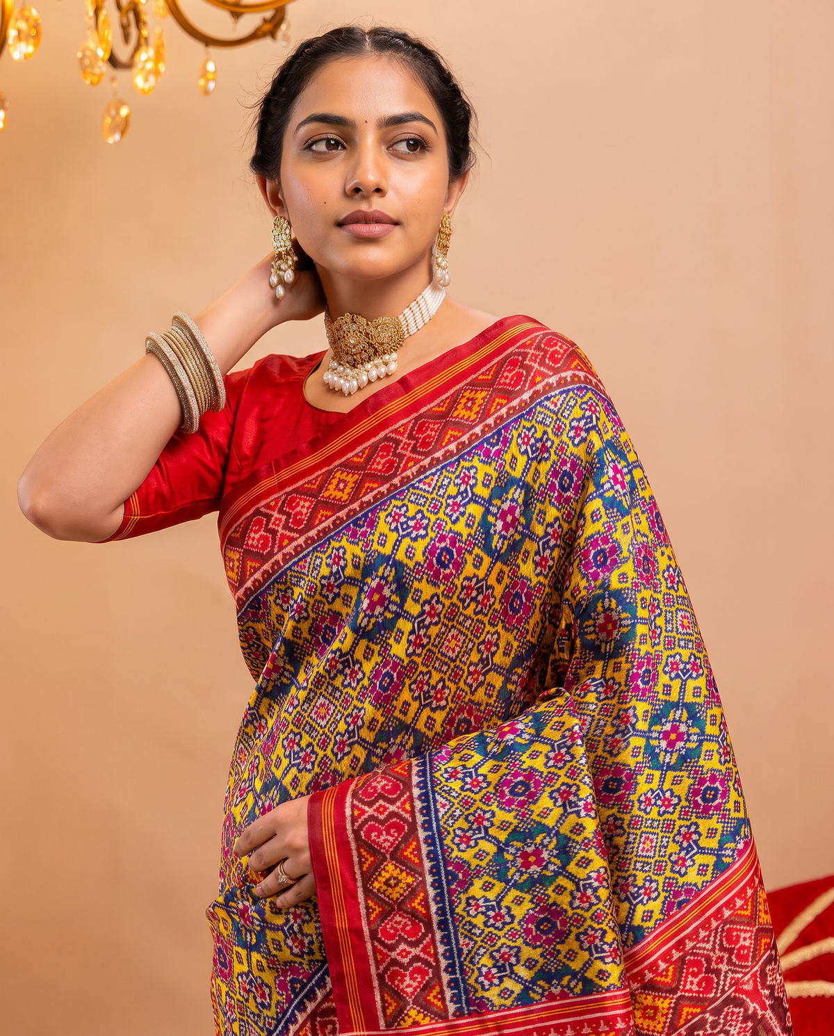 Navratna, nine gems woven in indigo and gold. Handloom Rajkot Patola from Gujarat.