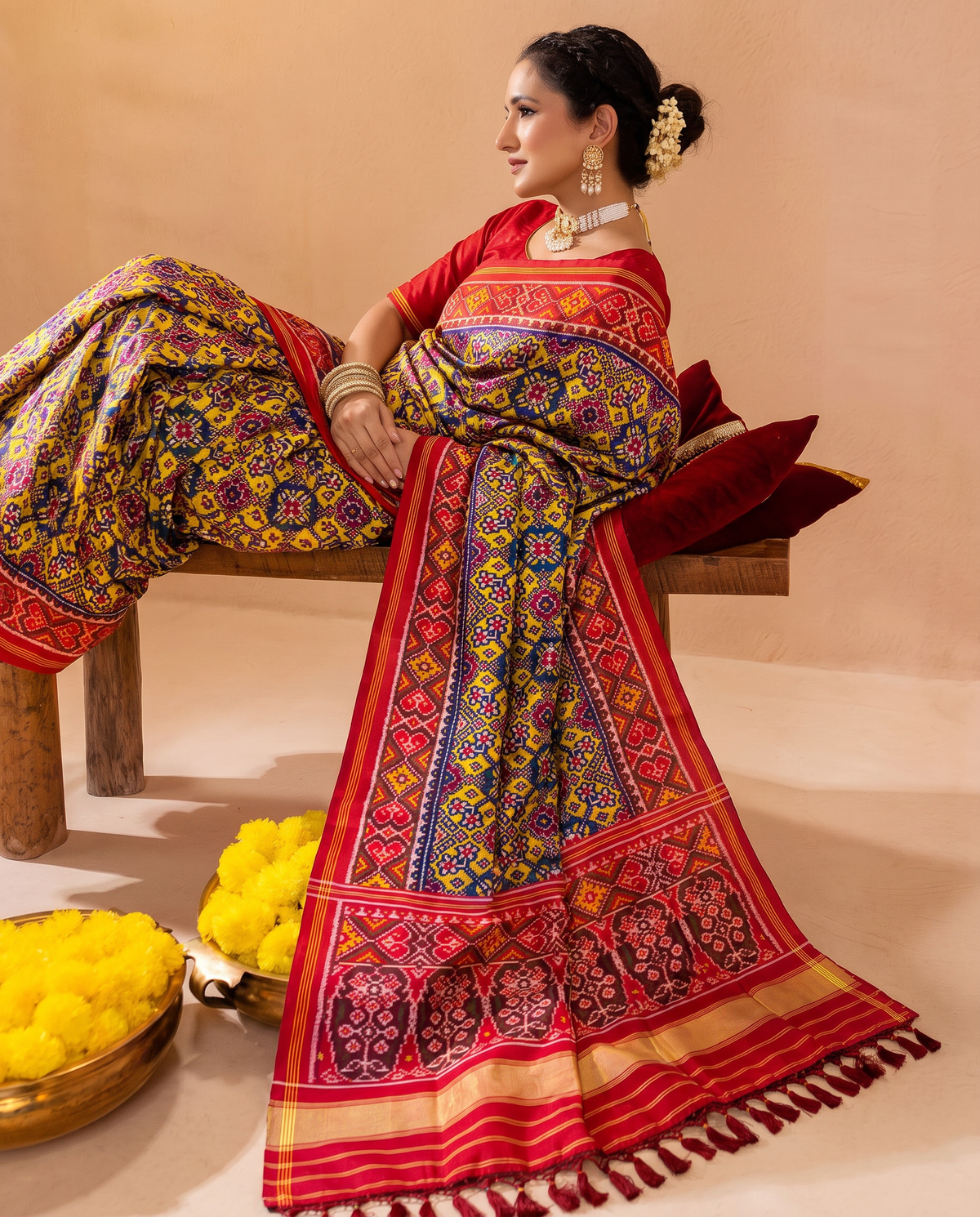 Navratna, nine gems woven in indigo and gold. Handloom Rajkot Patola from Gujarat.