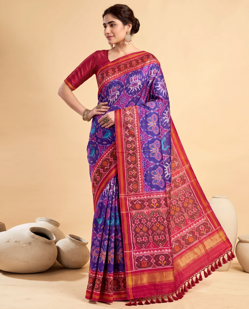 Purple dreams in a rani pink frame. Handloom Rajkot Patola from Gujarat.