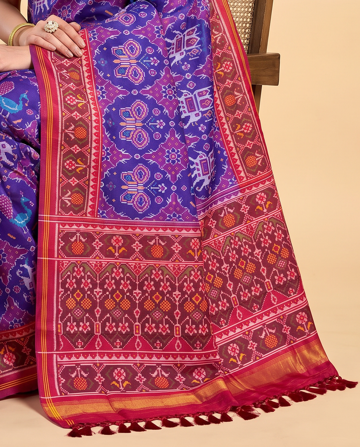 Purple dreams in a rani pink frame. Handloom Rajkot Patola from Gujarat.