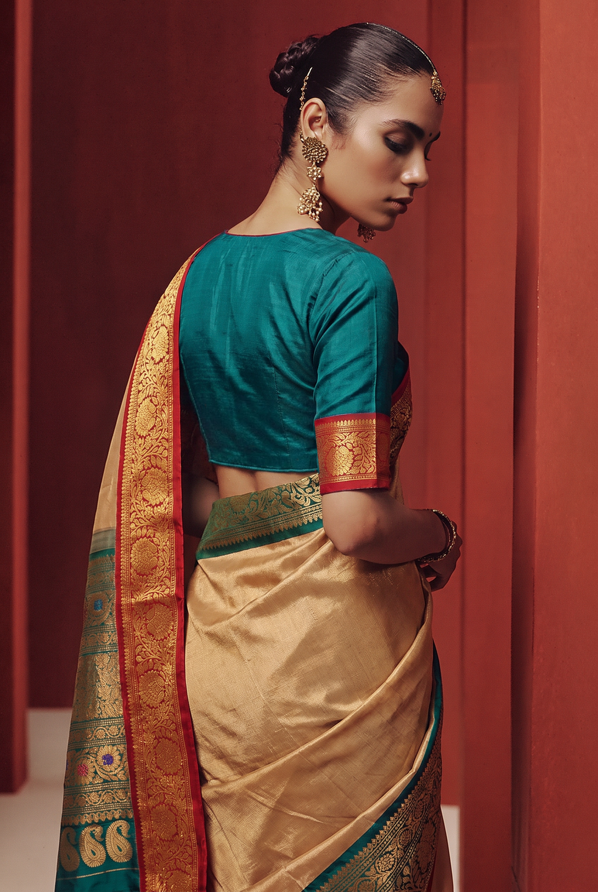 Twilight lavender, royal blue, golden paisleys. Handloom Gadwal silk.
