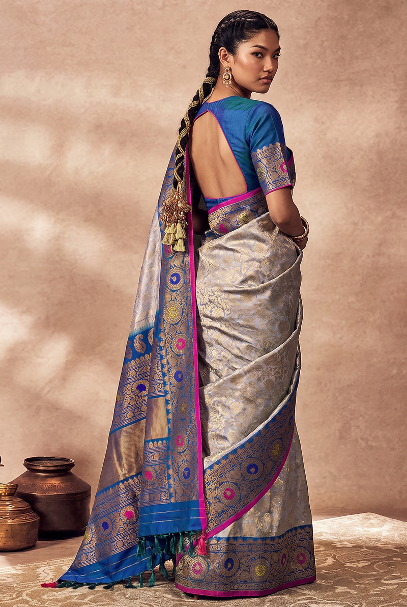 Lavender twilight, royal blue night, golden blooms. Handloom Gadwal silk.